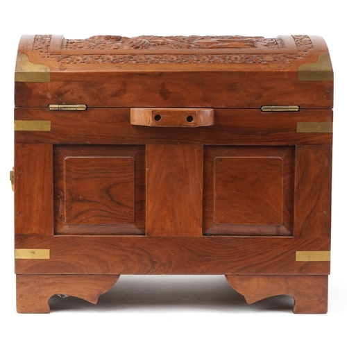 1288 - Indian Chinese style hardwood trunk in the form of a treasure chest with inset brass mounts and carr... 