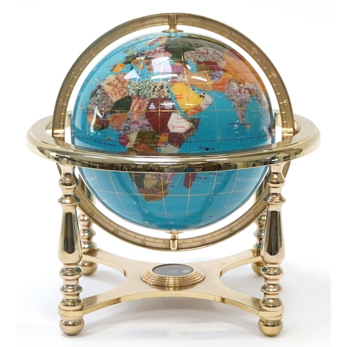 746 - Contemporary polished stone table globe with brass stand and compass under tier, 33cm high