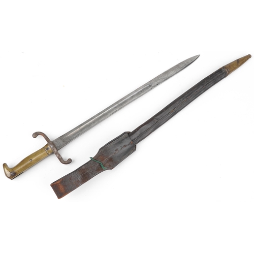 1897 - German military interest bayonet with scabbard and leather frog, the steel blade impressed EBR Weyer... 