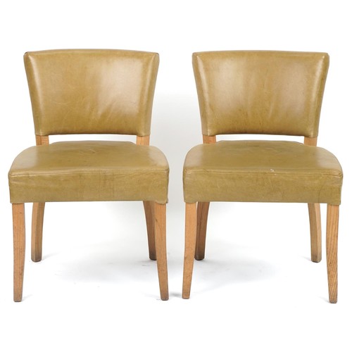 1089 - Wych Wood Design, pair of contemporary light oak chairs with green leather upholstery, 87cm high