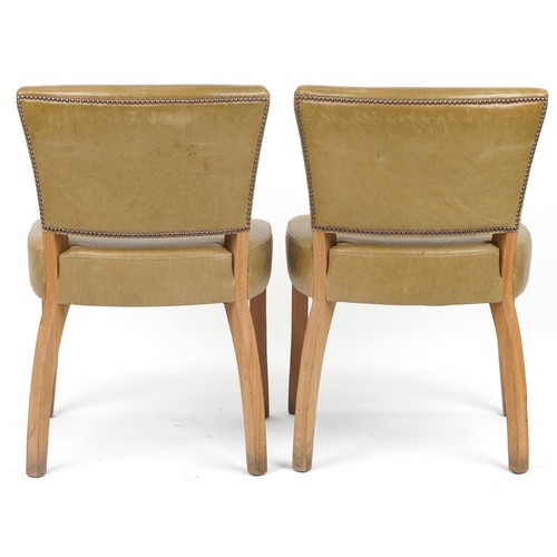 1089 - Wych Wood Design, pair of contemporary light oak chairs with green leather upholstery, 87cm high