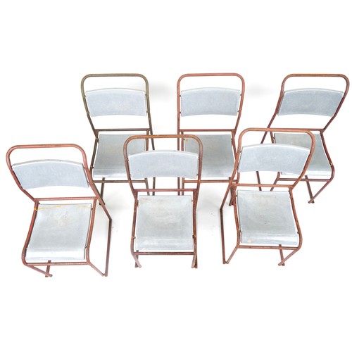 1103 - Thirteen industrial metal framed stacking chairs, each 85cm high