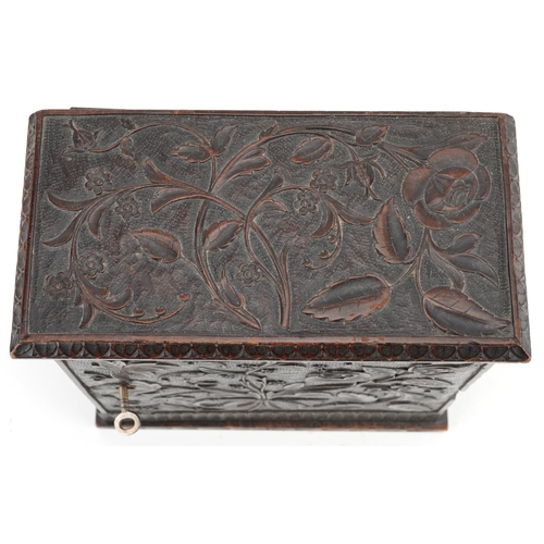 202 - 19th century oak table top collector's chest finely and profusely carved with foliage having hinged ... 