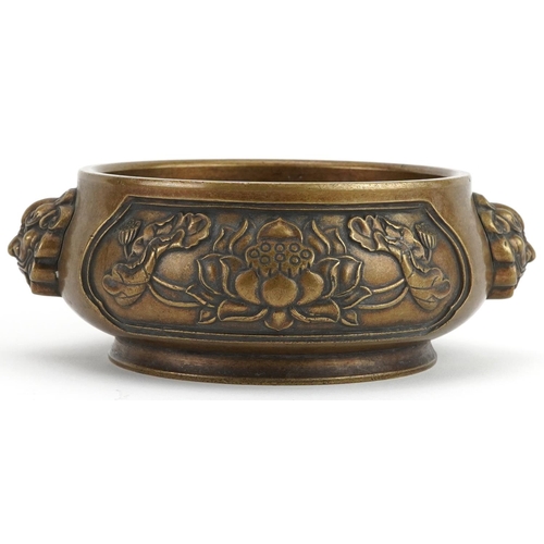 511 - Chinese patinated bronze censer with animalia handles cast in relief with panels of flowers, four fi... 