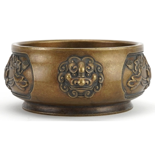 511 - Chinese patinated bronze censer with animalia handles cast in relief with panels of flowers, four fi... 