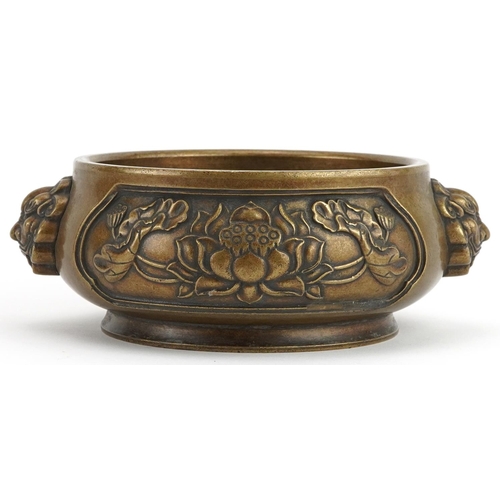 511 - Chinese patinated bronze censer with animalia handles cast in relief with panels of flowers, four fi... 