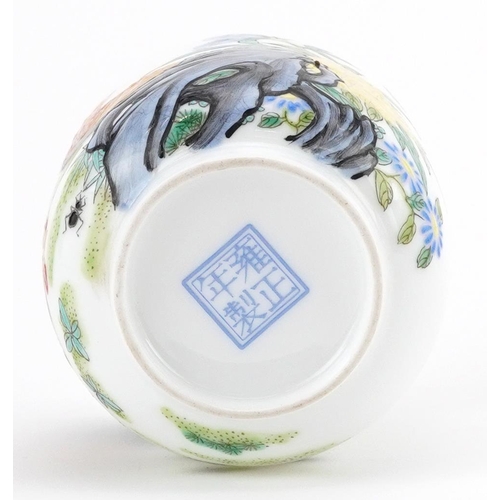 1340 - Chinese porcelain cup hand painted with two cockerels in a landscape, four figure character marks to... 