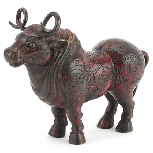 348 - Chinese partially gilt and red lacquered bronze  mythical animal, 22.5cm in length