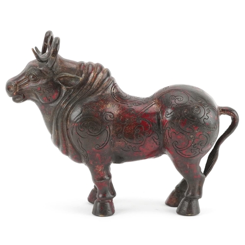 348 - Chinese partially gilt and red lacquered bronze  mythical animal, 22.5cm in length