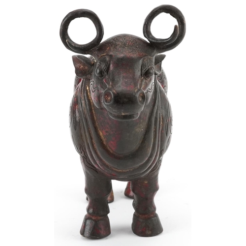 348 - Chinese partially gilt and red lacquered bronze  mythical animal, 22.5cm in length