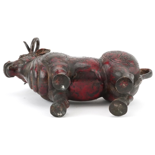 348 - Chinese partially gilt and red lacquered bronze  mythical animal, 22.5cm in length