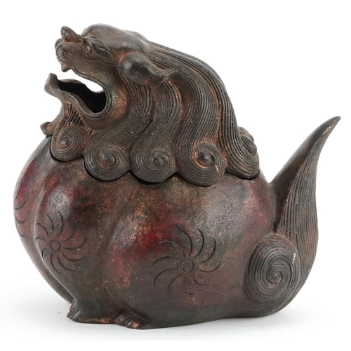 265 - Chino Tibetan partially gilt and red lacquered incense burner in the form of a mythical animal, char... 