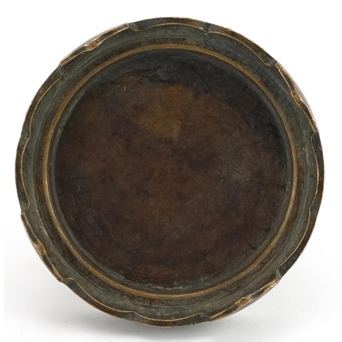 437 - Chinese patinated bronze four footed censer stand, 9.5cm in diameter