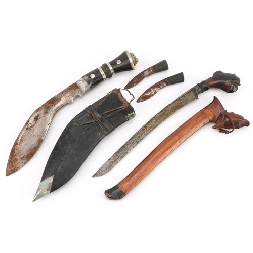 1907 - Javanese Kris dagger with hardwood sheath and handle and a Gurkha's kukri knife with horn handle, th... 