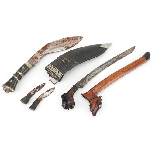 1907 - Javanese Kris dagger with hardwood sheath and handle and a Gurkha's kukri knife with horn handle, th... 