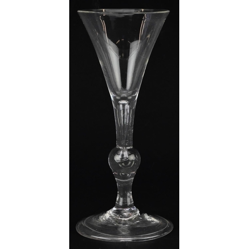 50 - 18th century wine glass on folded foot with knopped stem and enclosed bubble, 17cm high