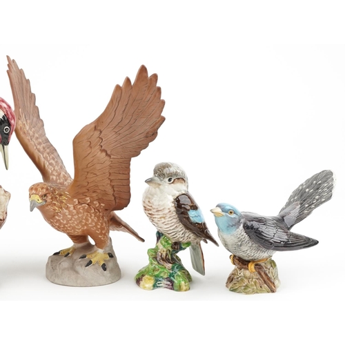 687 - Six Beswick birds including Golden Eagle and Woodpecker, the largest 26cm high