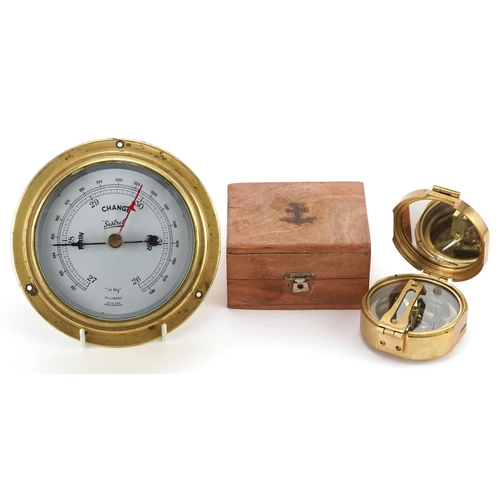 1323 - Shipping interest bulk head Sestrel wall barometer and a naval interest compass with hardwood case, ... 