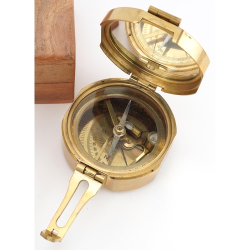 1323 - Shipping interest bulk head Sestrel wall barometer and a naval interest compass with hardwood case, ... 