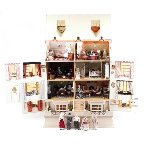 1644 - Large hand painted, hand made Georgian style wooden doll's house with electrics housing a collection... 