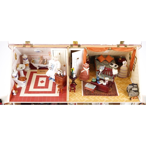 1644 - Large hand painted, hand made Georgian style wooden doll's house with electrics housing a collection... 