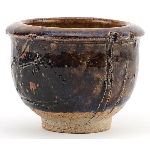 1538 - Japanese studio pottery Yunomi tea bowl having a purply brown glaze, 8.5cm in diameter