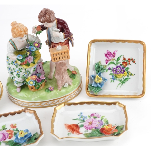 418 - Dresden, German porcelain comprising a summer figure group of a young boy and girl holding flowers f... 