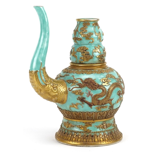 557 - Chinese porcelain turquoise ground wine vessel gilded with dragons and bats amongst clouds, six figu... 