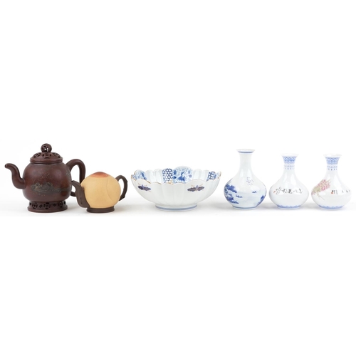 1302 - Chinese and Japanese ceramics including two Yixing teapots and two eggshell porcelain vases hand pai... 