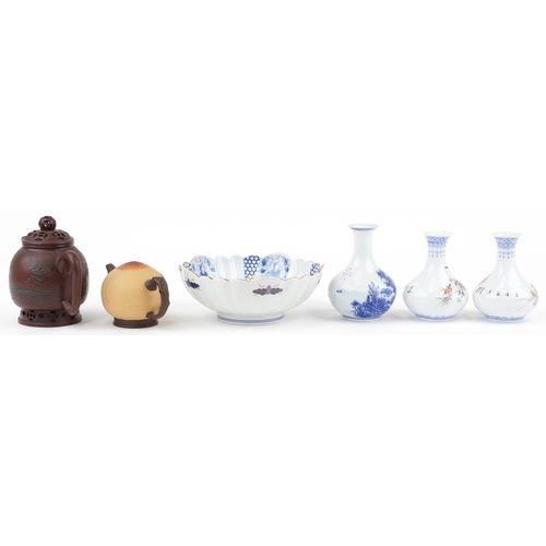 1302 - Chinese and Japanese ceramics including two Yixing teapots and two eggshell porcelain vases hand pai... 