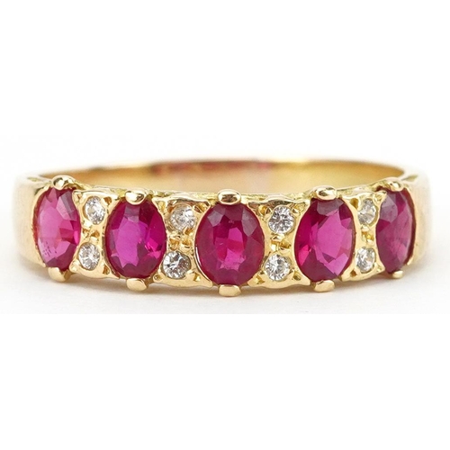 2205 - 18K gold ruby and diamond half eternity ring set with five rubies and eight diamonds, each ruby appr... 