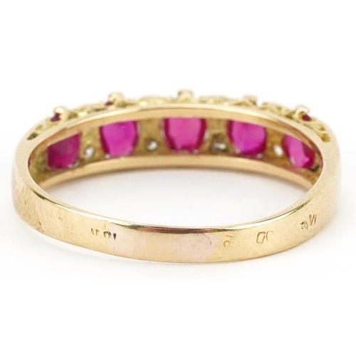 2205 - 18K gold ruby and diamond half eternity ring set with five rubies and eight diamonds, each ruby appr... 