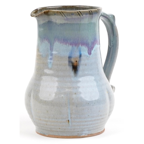 104 - Michael Leach, large Yelland studio pottery jug having a mottled purple-brown glaze, impressed marks... 