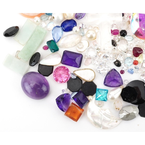 2764 - Large collection of loose semi precious gemstones and cameos including sapphires, amethyst, topaz, j... 