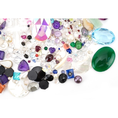 2764 - Large collection of loose semi precious gemstones and cameos including sapphires, amethyst, topaz, j... 