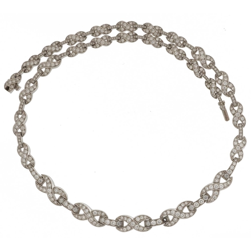 2253 - Good platinum diamond infinity link necklace, the largest diamonds approximately 2.10mm in diameter,... 