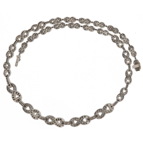 2253 - Good platinum diamond infinity link necklace, the largest diamonds approximately 2.10mm in diameter,... 