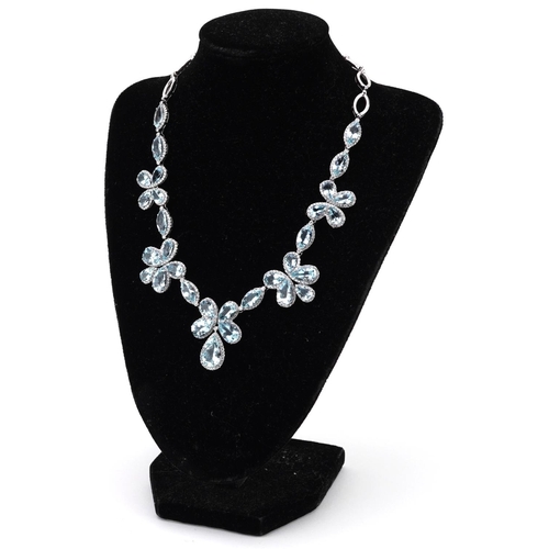 Good 18ct white gold teardrop aquamarine and diamond floral necklace, the largest aquamarine approximately 15.10mm x 10.0mm x 6.60mm deep, 40cm in length, 53.0g