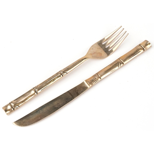 732 - Thai twelve place canteen of bronze cutlery with simulated bamboo handles, the canteen 46cm wide