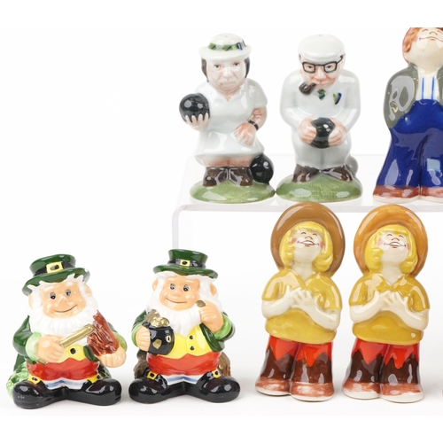 702 - Thirteen novelty porcelain figural casters including seven Wade examples, the largest 12cm high