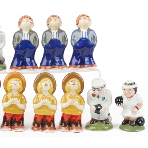 702 - Thirteen novelty porcelain figural casters including seven Wade examples, the largest 12cm high