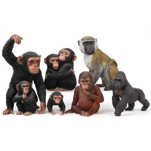 1290 - Six large hand painted model monkeys and a group of two chimpanzees, the largest 42cm high