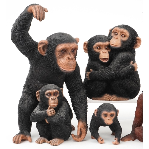 1290 - Six large hand painted model monkeys and a group of two chimpanzees, the largest 42cm high