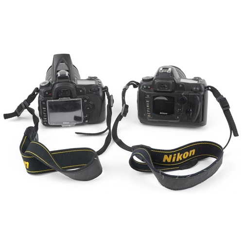 1671 - Two Nikon cameras with lenses comprising D 90 with Nikon DX AF-F Nikkor 18-105mm lens and D70 with N... 