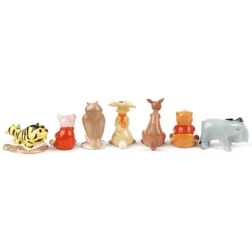 686 - Seven Beswick and Royal Doulton Disney Winne the Pooh characters including Winnie the Pooh, Tigger a... 