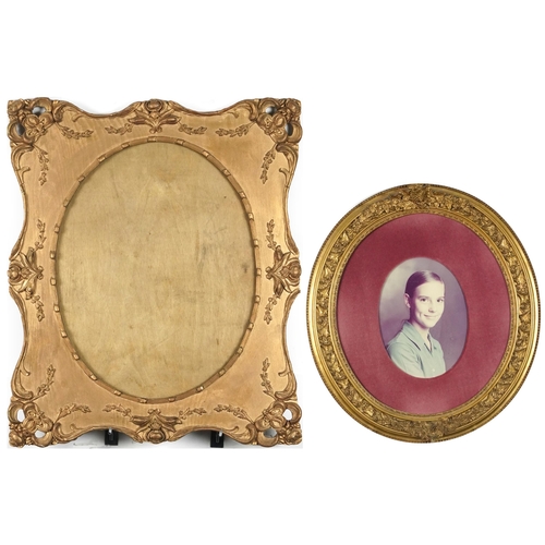 1705 - Two classical gilt picture frames with oval apertures, the largest overall 66cm x 55.5cm, the larges... 