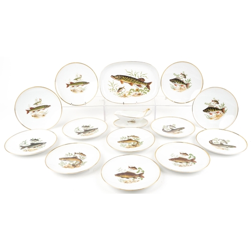 J K W Decor Carlsbad, Bavarian porcelain fish service decorated with various fish comprising twelve plates, oval serving platter and sauceboat, the largest 35.5cm wide