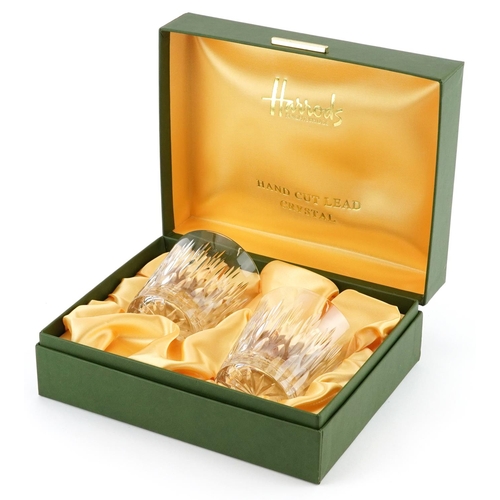 743 - Pair of Harrods crystal glasses housed in a fitted box, each glass 8cm high