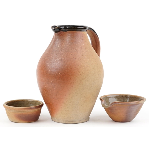 105 - John Leach, Muchelney studio pottery including a large jug having a brown glaze, the largest 30cm hi... 