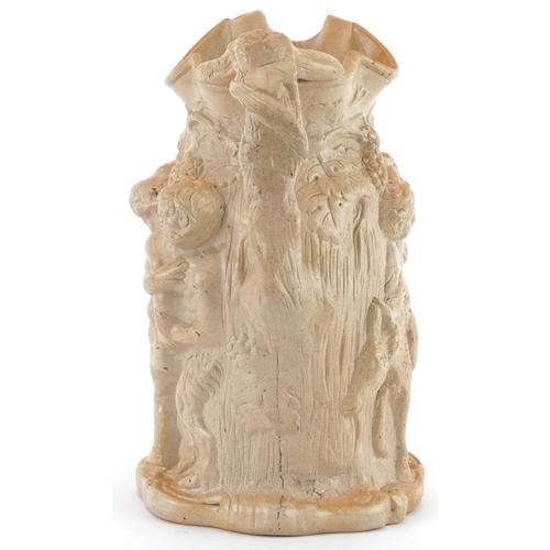 217 - 19th century salt glazed Greek mythological jug decorated in relief with Silenus & Bacchus, 22cm hig... 